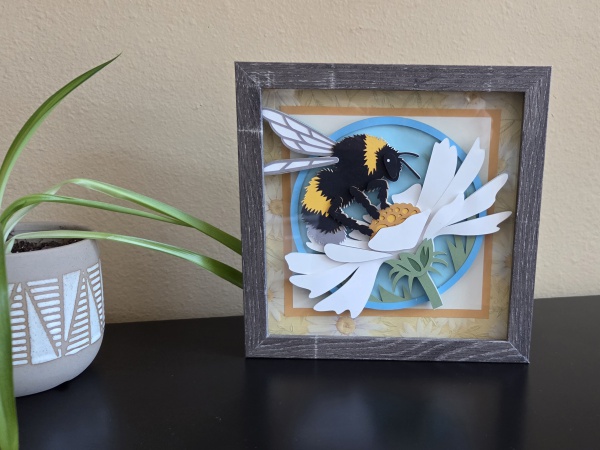 Bee with plant cropped